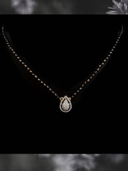 A duplicate image of the pear-shaped diamond mangalsutra. Its simple yet sophisticated design makes it one of our most requested pieces for the modern bride.