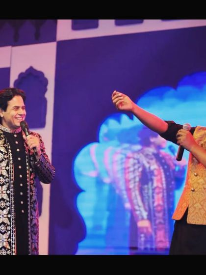 Interacting with the host on stage. A live performance is not just about the art; it's about engaging with the audience and creating a complete, entertaining experience.
