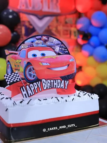 A close-up of one of the flat cakes from the Cars-themed party, perfect for easy serving.
