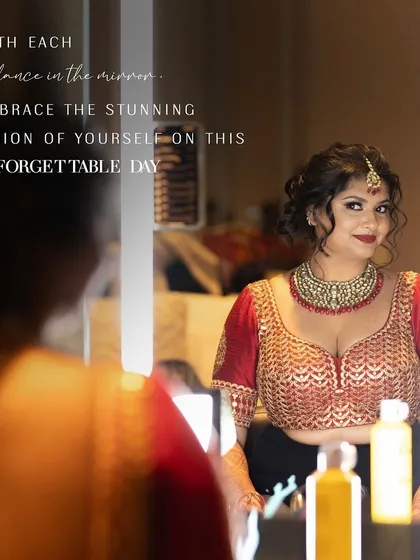 With each glance in the mirror, embrace the stunning vision of yourself. A beautiful shot of the bride getting ready, her reflection showing her complete, elegant look.