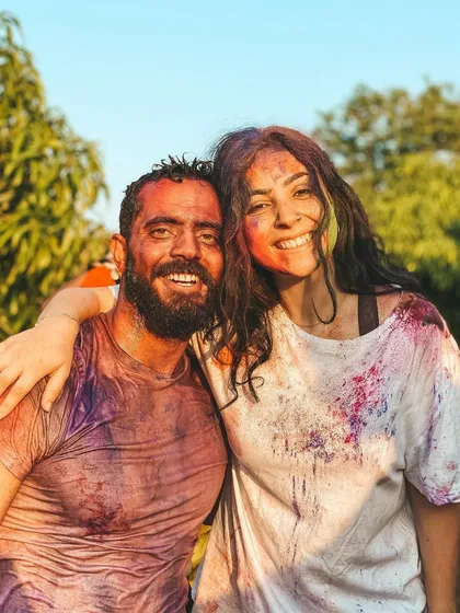 This is a duplicate of image 74. A moment of pure joy and connection during our Holi festival celebrations.