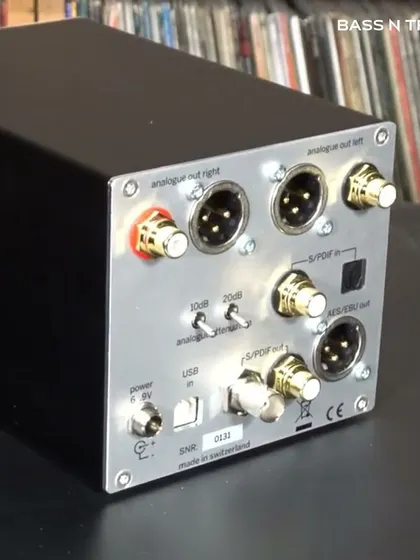 The back of the "Magic Cube": the Weiss DAC204. Its simple, high-quality connections and gain switches are a welcome feature for purists who value sound over frills.