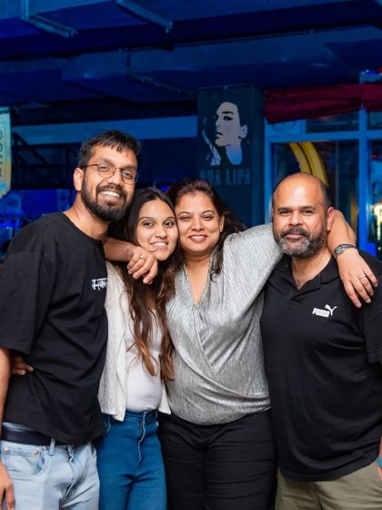 This group of friends is all smiles. It's what I love to see at my pub.