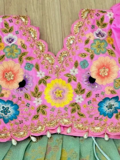 A closer look at the exquisite hand embroidery on one of my blouses. This level of detail, known as maggam work, is what makes each piece a unique work of art.