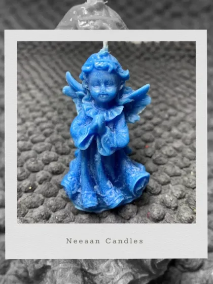 Hand-poured magic in every detail. Meet our heavenly blue angel candle, a symbol of peace, love, and craftsmanship.