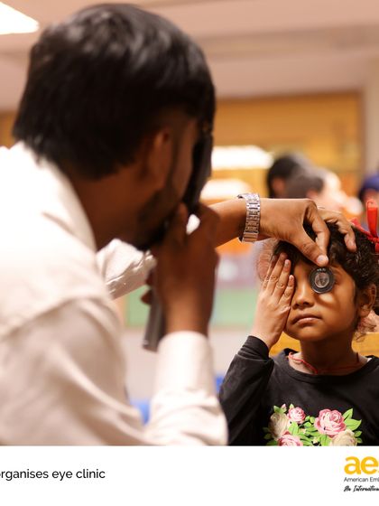 A young girl gets her vision tested at the MAD club's eye clinic. Providing access to essential healthcare services is one of the many ways our students make a tangible difference.