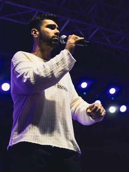 A solo artist delivering a powerful vocal performance. I ensure the sound engineering is flawless, so every note is heard with crystal clarity throughout the venue.