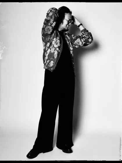 A candid moment of laughter from Taba Chake during our studio session. These unposed shots are often the most memorable.