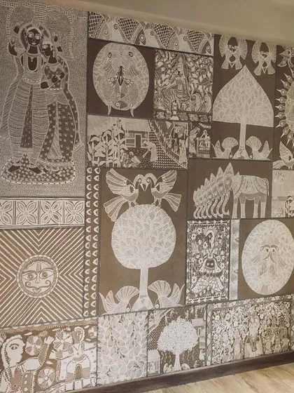 I take pride in installing wallpapers that are rich in cultural detail, like this beautiful mural featuring traditional Indian folk art. The intricate patterns and figures tell a story and add a unique, artistic touch to the space.