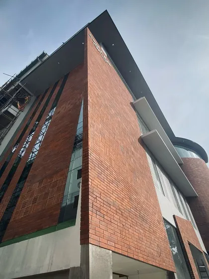 A symphony of brick and glass, designed for indulgence, connection, and creativity. This brewery facade combines industrial and modern elements to create an inviting landmark.