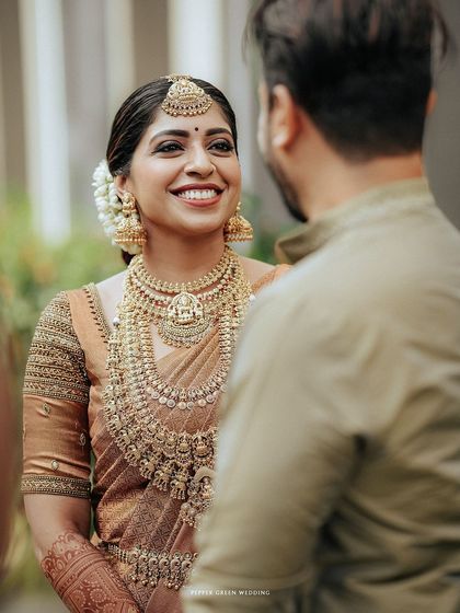 A beautiful portrait of the bride looking at her groom, her face full of love and happiness.