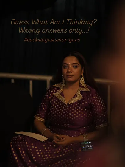 A quiet moment of focus backstage before the grand finale of Rangilo Re. Channeling my energy inward is a crucial part of my process to deliver a powerful, hours-long performance.