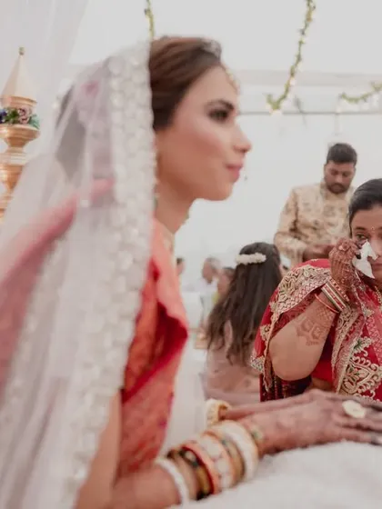 The emotional moment when a mother sees her daughter as a bride, a mix of joy and tears. We are there to manage the event so families can experience these feelings fully.
