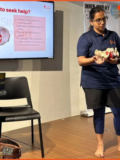 A close-up of our physiotherapist using an anatomical model to explain pelvic floor function. This highlights our commitment to providing clear, science-based education to empower female athletes.