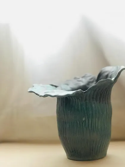 Another angle of the Wild Petal Vase, showing its organic shape and textured surface.