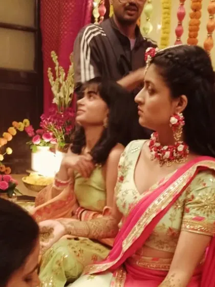 Here I am applying mehendi for an actress on a film shoot. We are experienced in providing professional mehendi services for events and productions.