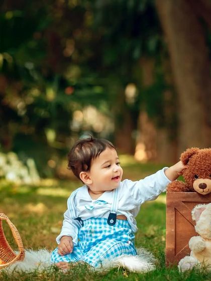 A sweet interaction with a teddy bear. These are the simple, precious moments I love to capture.