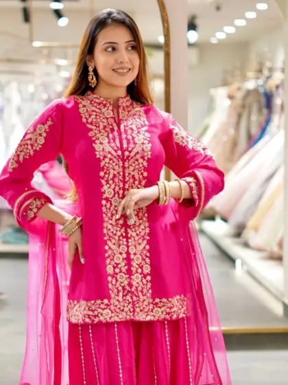 Golden threads and timeless elegance on this beautiful pink sharara set.