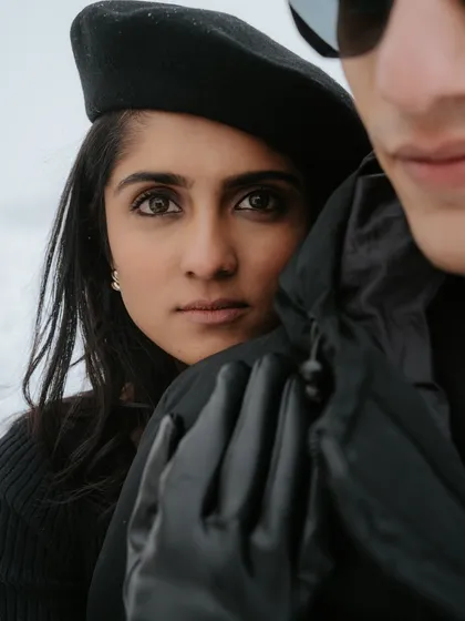 A powerful and intimate close-up from our Azerbaijan shoot. Her direct gaze and the chic styling with the beret create a portrait that is both fashionable and deeply personal.