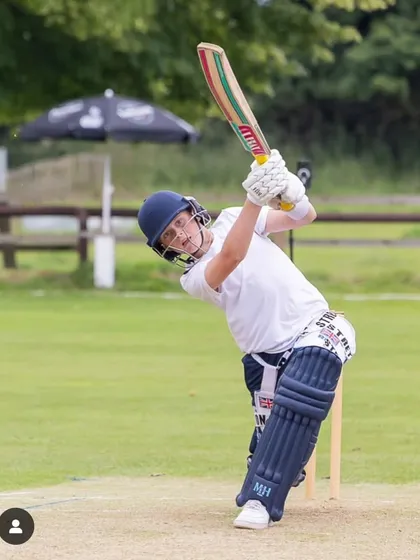 My student Rupert, a future star for England, playing a perfect straight drive. His technique is a model for other young players.