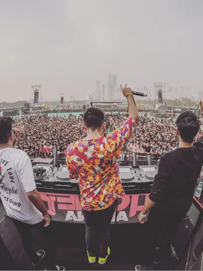 On stage in Mumbai, facing a sea of our AfterLifeFam. Performing at massive music festivals and arenas is what we do, bringing our unique sound to thousands of fans.