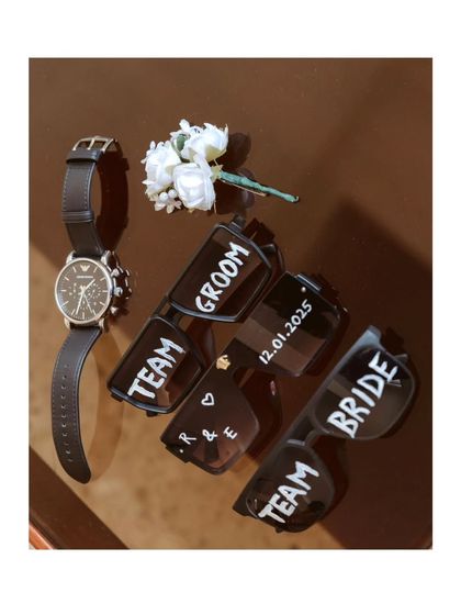 The little details that bring the wedding party together. Custom sunglasses for the bride, groom, and their teams add a fun, personal touch for photos before and after the ceremony.