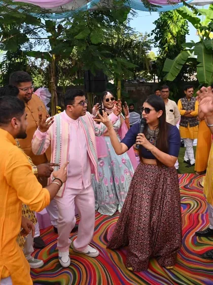 Dancing in the middle of the crowd with the family. I don't just stay on stage; I get down on the dance floor to share the energy.