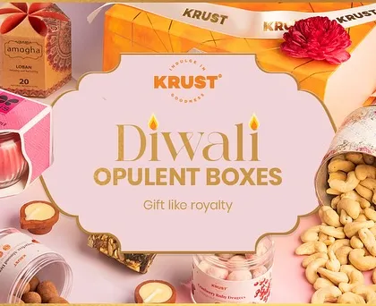 Our Diwali Opulent Boxes are the perfect way to gift like royalty. This image showcases the beautiful packaging and the variety of premium treats inside.