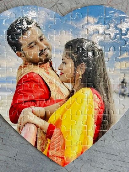 A close-up of a completed heart puzzle, showing the glossy finish I apply to make the photo vibrant and durable.