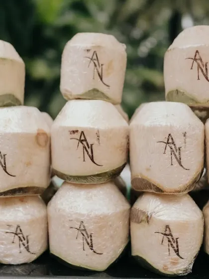 It's the small personal touches that make a wedding unique. For this event, we arranged for custom-monogrammed coconuts to welcome guests, offering a refreshing and memorable start to the Haldi celebrations.