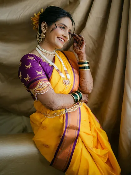 This bride's happy feedback makes my work so fulfilling. Her Peshwai look in a yellow nauvari is a perfect example of minimal, radiant beauty.