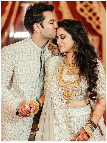 A tender moment with a forehead kiss. Even during the high energy sangeet, we find opportunities to capture quiet, romantic portraits.