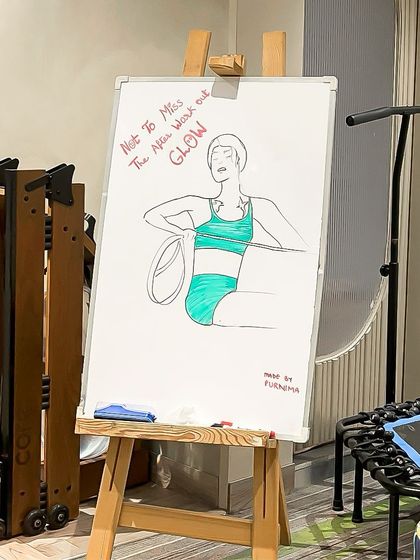 We love to add a touch of creativity and motivation around the studio. This whiteboard art reminds our clients to check out our new workout and find their inner glow.