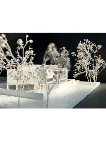 An early conceptual model for the Nandi House. We use simple massing models like this to study the building's form and its relationship to the site.