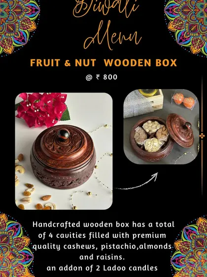 This menu item highlights the handcrafted wooden box, a beautiful keepsake gift filled with dry fruits and accompanied by two Laddoo candles.