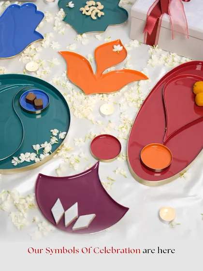 Our 'Symbols of Celebration' collection made its debut at The Wedding Collective. This flat lay showcases the variety of shapes and colours, designed to bring meaning and artistry to wedding festivities and festive tables.