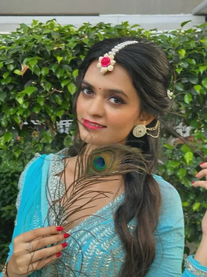 Close-up shots showing the expressive details of a semi-classical performance, from the hair and makeup to the hand gestures (mudras).
