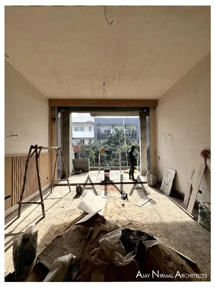 The interior of the DLF Phase 1 residence during construction. Even in its unfinished state, the large window opening frames the view and demonstrates the design's focus on light.