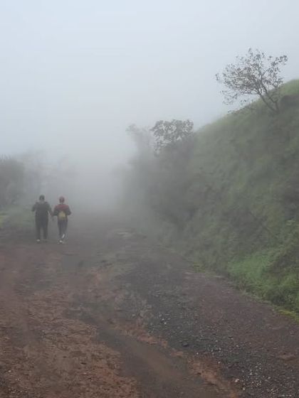 Trekking on the misty, muddy path towards Kodachadri peak. The journey is as beautiful as the destination.