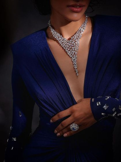 A close-up on a statement diamond necklace from Purab Paschim, showing the piece's unique structure and brilliance.