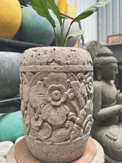 Another shot of the 'Madu' planter, with a Buddha statue in the background, emphasizing the tranquil, Balinese aesthetic.