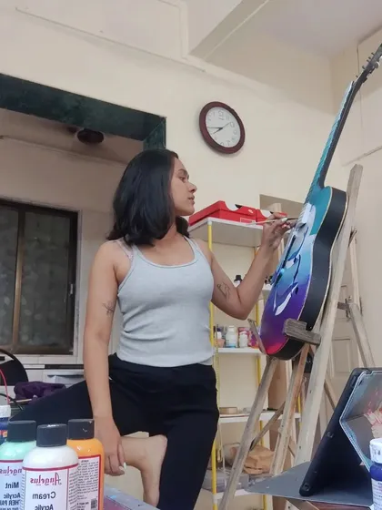 Here’s a glimpse of me in my element. Painting isn't just a job, it's my passion. Whether it's a tiny detail on a sneaker or a large piece on a guitar, I get lost in the process of creating something unique and personal for you.