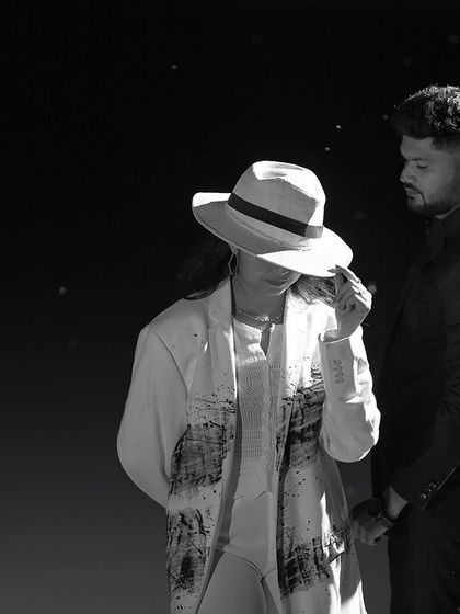 A creative collage blending color and monochrome, focusing on the details of the couple's modern pre-wedding look.