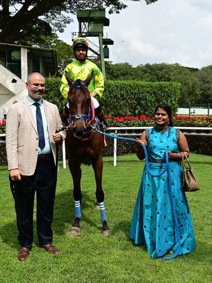 El Alamein, winner of The Racing Officials Cup, poses with jockey Vivek.G and the proud owners, Mrs. Kokila.E & Mr. Arun Kumar.K.N.