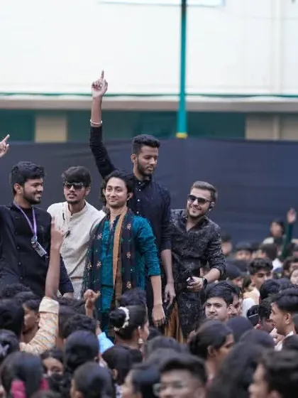 A shot from within the crowd, showing students enjoying the college fest atmosphere.