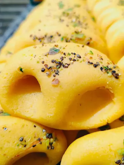 A close-up of my delicious Kesar Peda, garnished with chopped pistachios and cardamom. The rich flavour of saffron makes this a truly special treat.