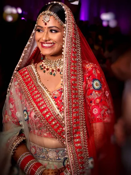 The pure, uninhibited smile of a happy bride. Our goal is to make you feel comfortable and confident, which allows us to capture genuine expressions of joy like this one.