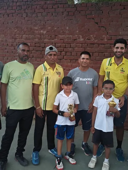 Our coaches with the winners from the TPL event. We celebrate every achievement, big or small.