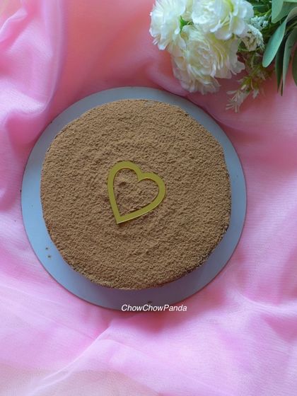 Sometimes you just want a simple, delicious cake. This is a classic Tiramisu-style cake, dusted with cocoa powder and finished with a simple heart.