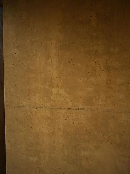 The texture of the earthen wall at the farm pavilion near Savanadurga, a surface that is both rustic and beautiful.